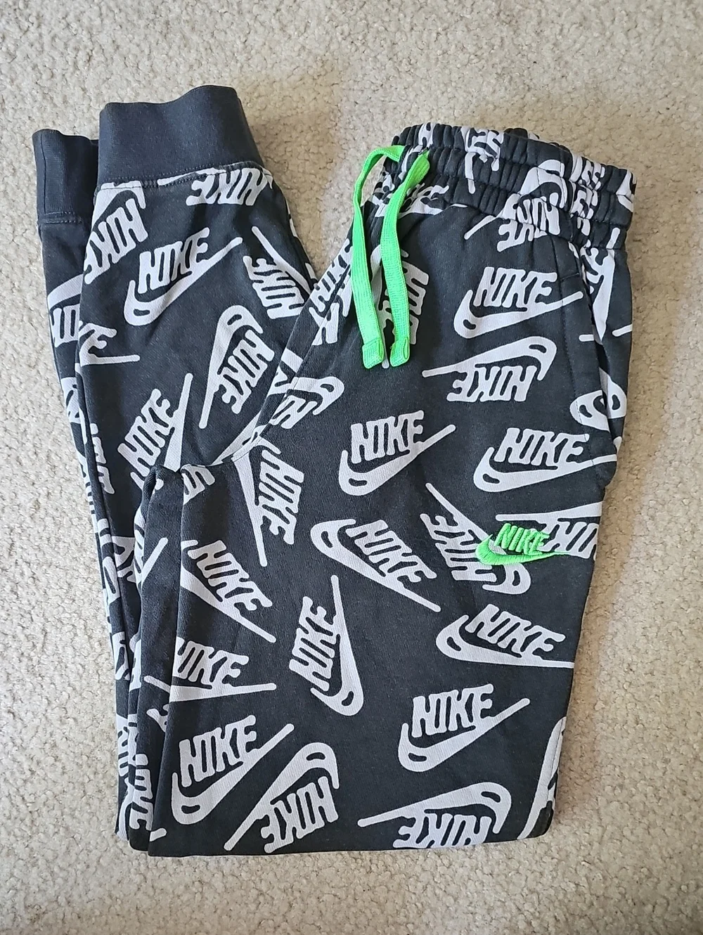 Nike Black All-Over Logo Joggers with Neon Green Drawcord